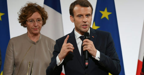 France's President Emmanuel Macron, flanked by French Labour Minister Muriel Penicaud, speaks during the Equipe de France des Metiers 2017 event at the Elysee Palace in Paris